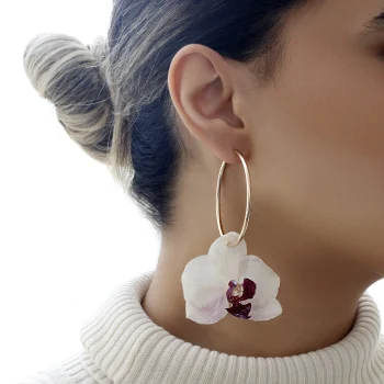aylar-white-orchid-hoop-earrings-on-model